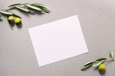 Blank paper card and olive branches, menu, invitation, postcard mock-upの写真素材