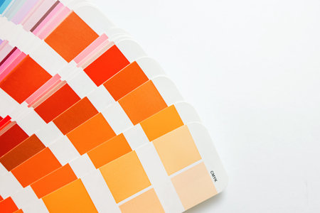 Color guide swatches of orange and red warm tones and peach colorの写真素材