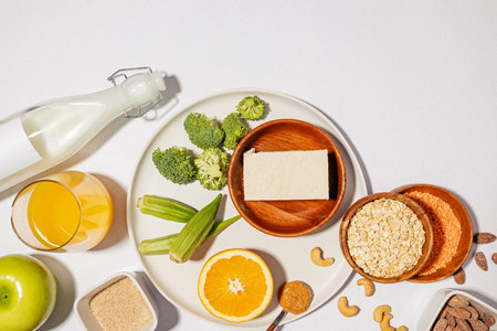 Foods for lowering cholesterol, tofu, lentils, okra, nuts, soy milk and other. Portfolio diet products, top viewの写真素材