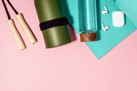 Fitness accessories on pink background, top viewの写真素材