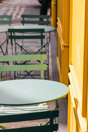 Minimalist metal table on the street Paris cafeの写真素材