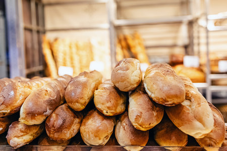Freshly baked baguettes close-up in the local Paris bakeryの写真素材