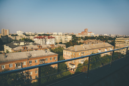 Streets of Kyiv city centre in evening light. Vintage yellow and orange brick buildings, european architectureの写真素材