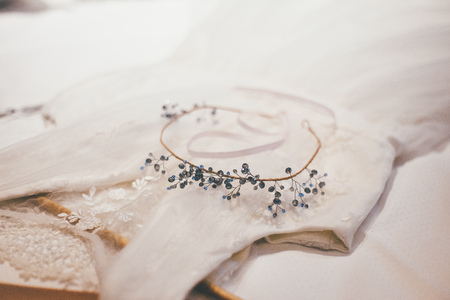 Gorgeous bridal wreath on the tender pastel wedding dressの写真素材