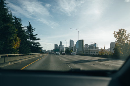 Picture of the tall city buildings, view seen from the car on road