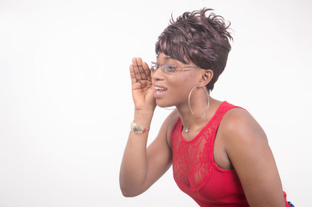 it is a secret to her collegue protecting the gestures of her lips.の写真素材