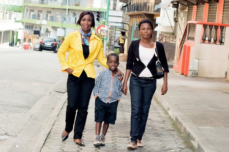 This family, together made a little walk in the street.の写真素材