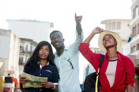 group of young smiling tourists.