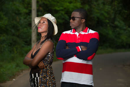 young couple in discord.difficulty relational: young couple arguing in the park.の写真素材