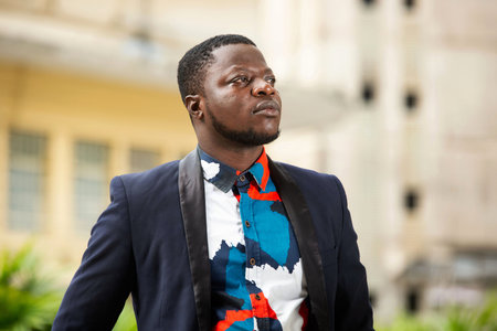 Handsome businessman looking for a side, relax profile pose with a natural face with a confident...
