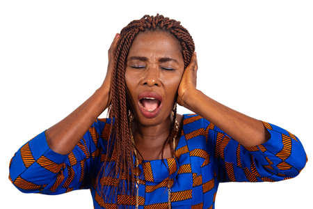 adult woman dressed in shocked traditional loincloth shouting with hands on her head. isolated on white backgroundの写真素材