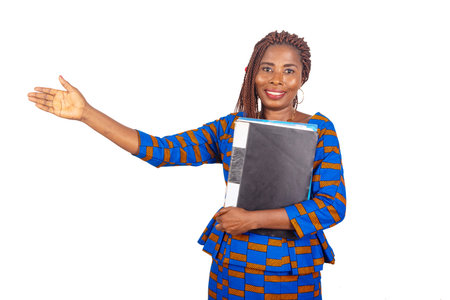 beautiful businesswoman in traditional dress standing on white background holding document and...