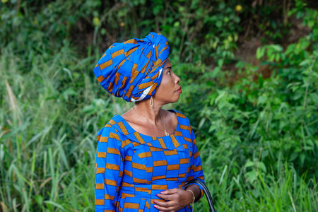 close-up of a beautiful mature african woman in the countryside