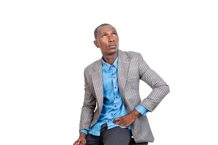 handsome serious adult businessman with raised eyes.