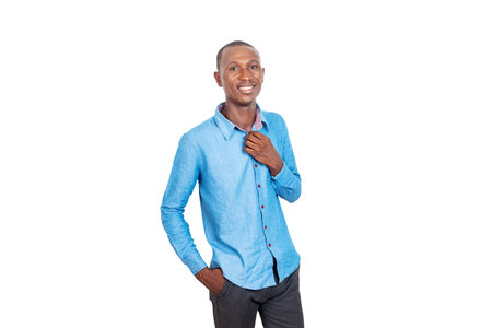 handsome serious adult businessman wearing blue shirt smiling at camera.