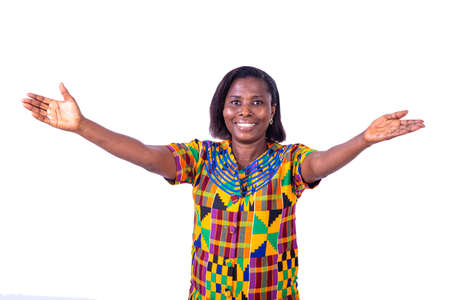 beautiful adult woman in a traditional loincloth welcoming with outstretched arms.の写真素材