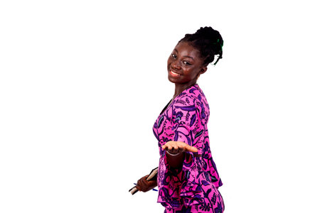 portrait of a beautiful young business woman showing empty space on her palm while smiling.