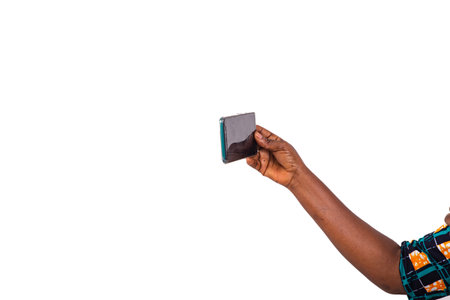 cropped view of hand of unknown person holding mobile phone.の写真素材