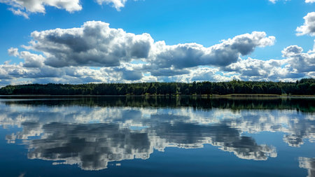White and pastel light reflections on water.の写真素材