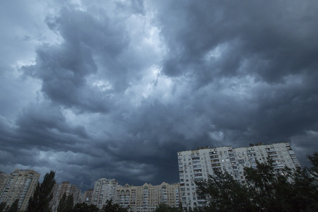 Heavy overcast sky above evening Kyivの写真素材