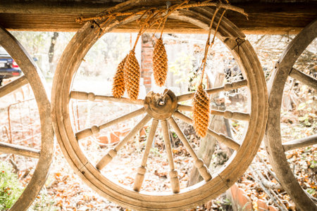 Wooden wheel from a cart. The wheel of the carriage.の写真素材