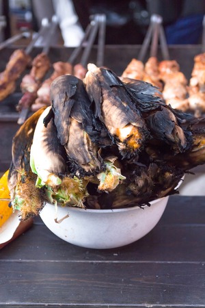Cooking corn on the grill in the skin.の写真素材