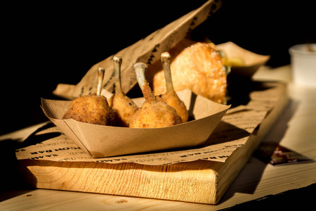 Baked chicken legs. Delicious chicken legs. Street food.の写真素材