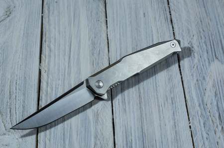 Folding knife for everyday carrying. Front side. Metal knife.の写真素材