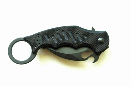 Tactical knife in a folded position on a white background.