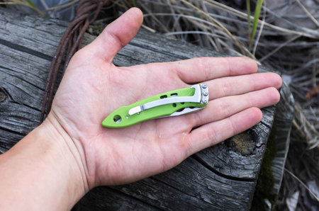 A small knife in the palm of your hand.