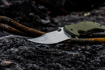 The knife is photographed at an angle. Blade of a knife. A dirty knife.の写真素材