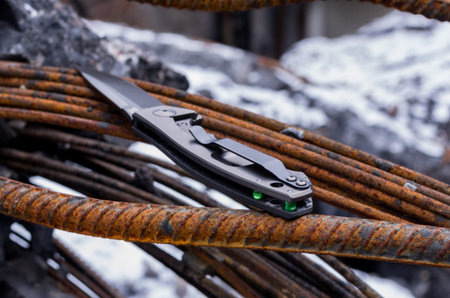 Kind of knife from behind. Photo at an angle. Construction and Urban.