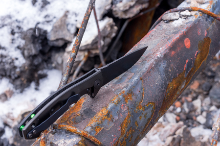 Black knife on rust. Top view. Ruinの写真素材