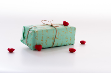 Turquoise box. Gift box. Gift box on white. Front view on a box.の写真素材