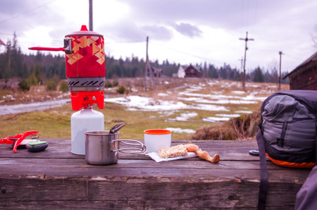 Kitchen system. Tourist tableware. Cooking in nature. Front view.の写真素材