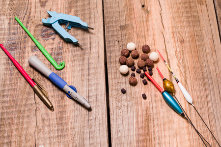 Fishing floats. Boilies and pellets for bait. Fishing on pellets. Front.の写真素材