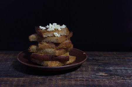 Snack from toast. Sandwich from toasts with garlic.の写真素材