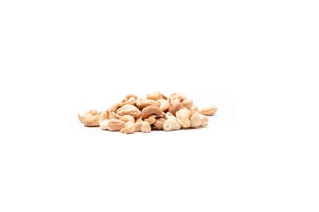A pile of cashew nuts. Cashew on a white background. Front view.の写真素材
