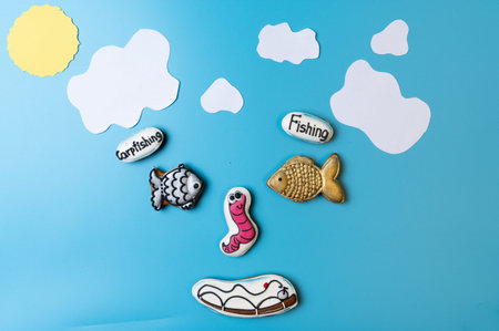 Fish-shaped gingerbread cookie. Gingerbread cookie and applique. Top.の写真素材