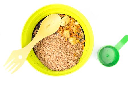 Buckwheat groats and dried meat. Sublimated meat with roasting. Cooking buckwheat porridge with meat. Flat lay.の写真素材