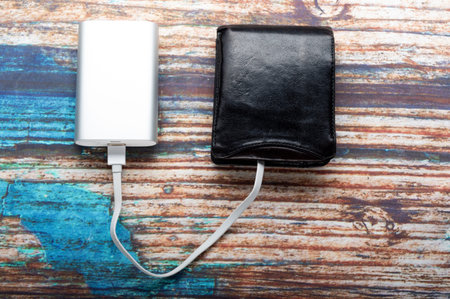 Leather wallet and charger. Wallet refill. Need to renew wallet. Top.