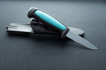 Scandinavian knife with a turquoise handle. Knife and scabbard.の写真素材