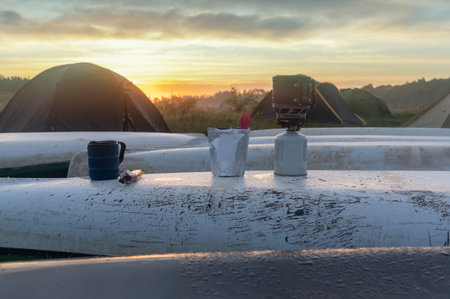 Preparing a tourist breakfast on the hike. Tourist food and snacks. Sunrise at base camp..