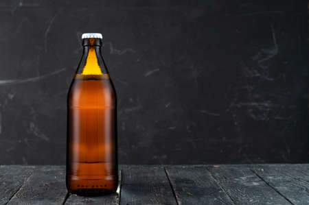 Closed bottle of beer. Brown bottle of beer.の写真素材
