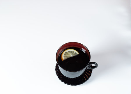 Cup of tea with lemon on a white background. View from above. Top.の写真素材
