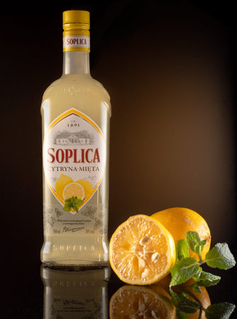Kyiv, Ukraine - Dec 12, 2020: vodka Soplica with lemon. Vertical frame.のeditorial素材