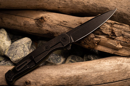 The reverse side of the pocket knife. Penknife with clip for carryng.