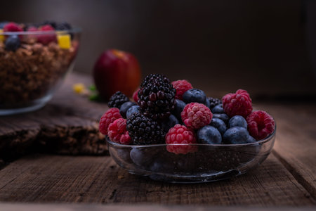 Various mix of berries. A set of berries with raspberries, blackberries and blueberries. Front view.