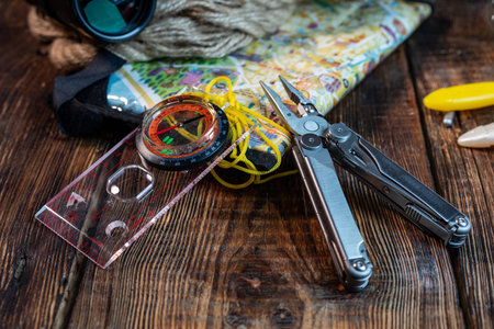 Map, compass and pliers. Orientation and location. Location search.の写真素材
