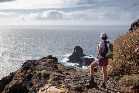 The traveler admires the panoramic view of the island from the viewpoint of "Roque de Santo Domingo.の写真素材